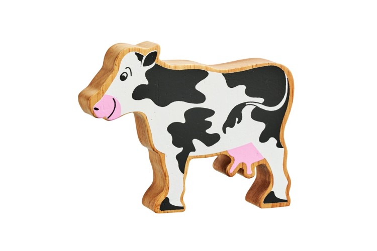 Natural black & white cow by Lanka Kade